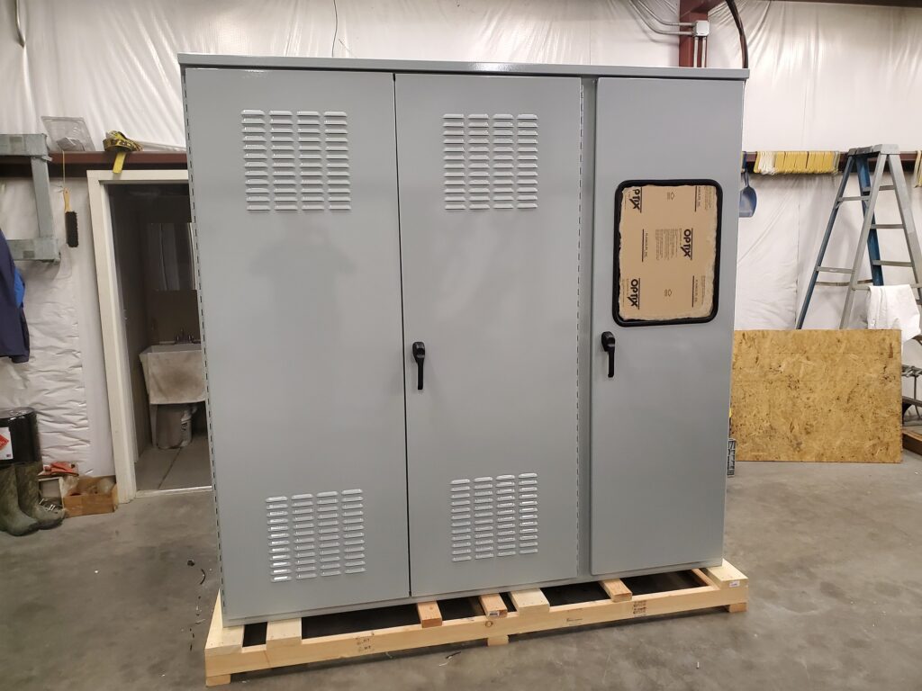 Enclosure door with turret punched panels